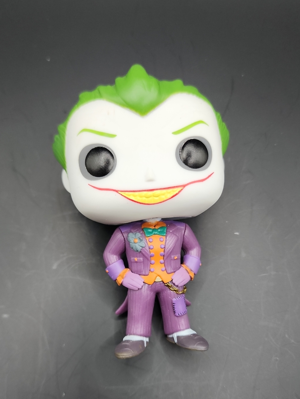 Funko Joker Vinyl Figure - Purple Suit with Green Hair and Yellow Smile